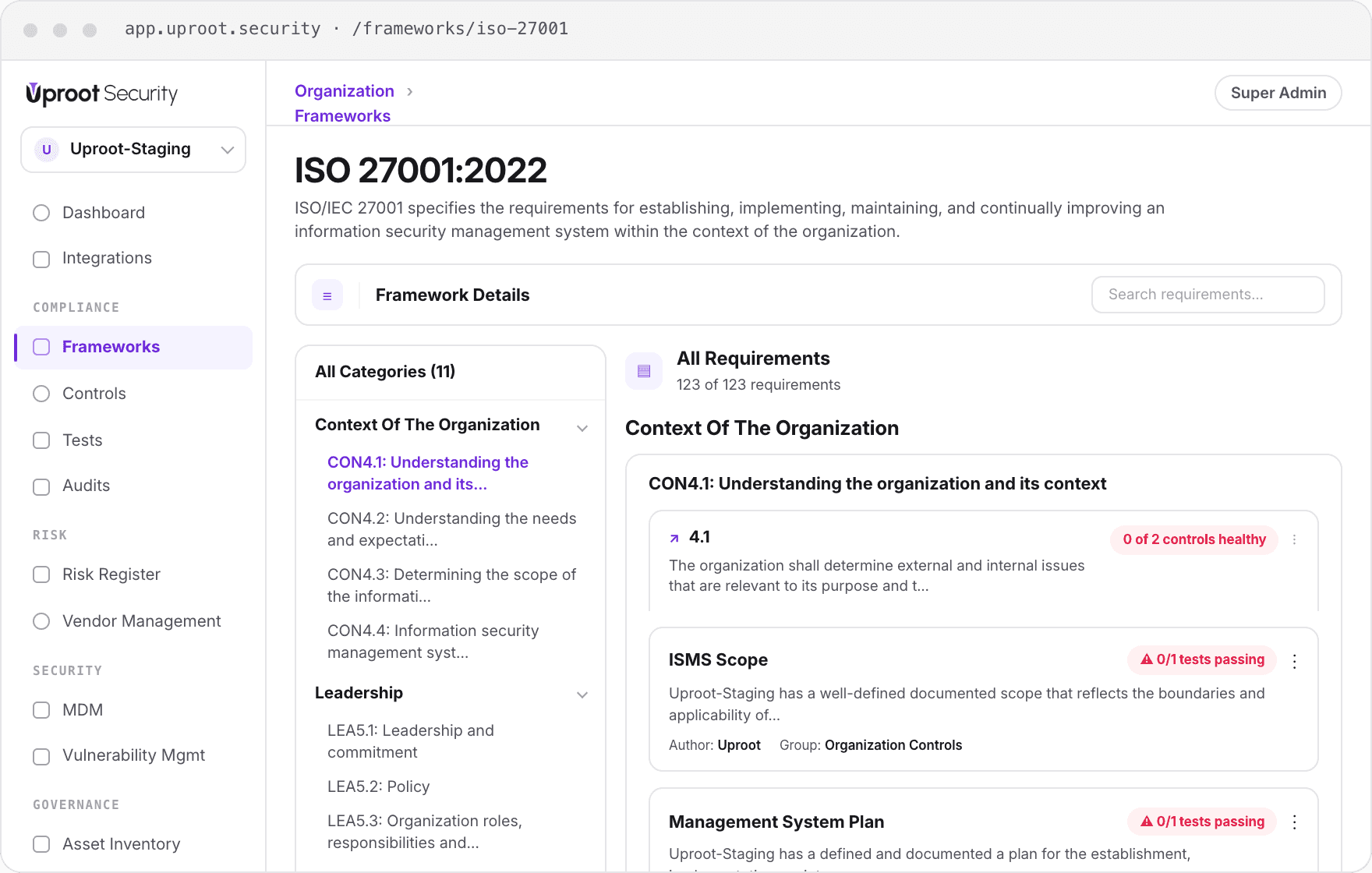 The Uproot Security app on the ISO 27001:2022 framework screen: 123 requirements across 11 categories, with per-control test status against the ISMS scope.